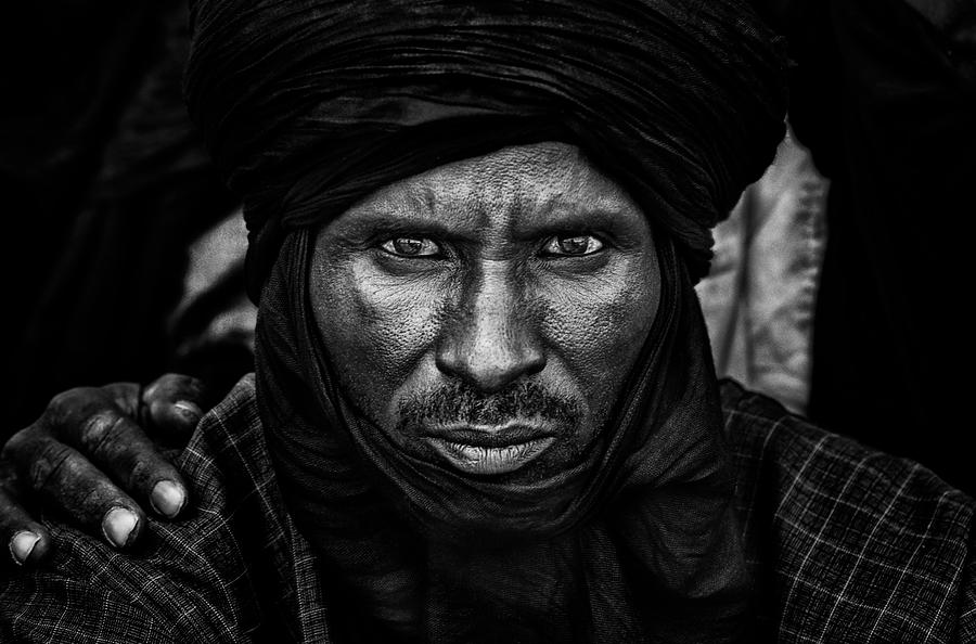 Portrait Photograph - Peul Man Watching The Gerewol Festival-i - Niger by Joxe Inazio Kuesta Garmendia