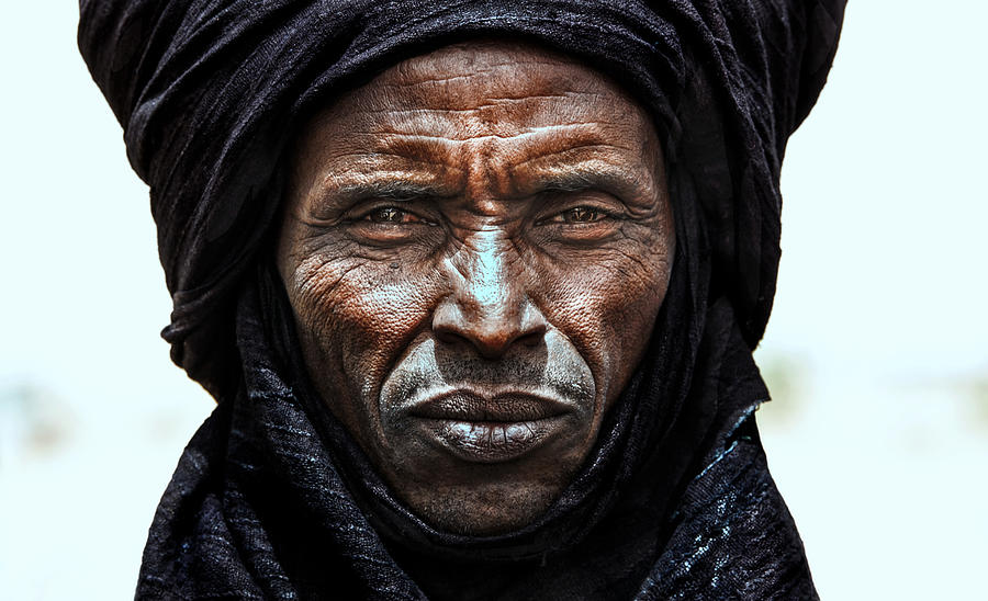 Portrait Photograph - Peul Tribe Man Watching The Gerewol Festival - Niger by Joxe Inazio Kuesta Garmendia