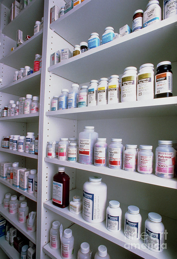 Pharmacy Store: Shelves Filled With Bottled Drugs Photograph by Food & Drug Administration/science Photo Library