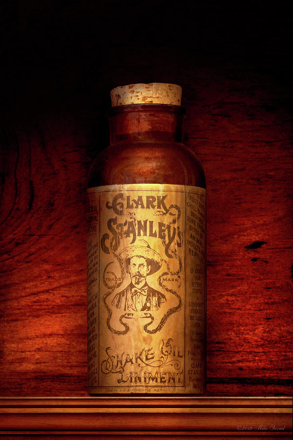 Pharmacy - The original Snake oil Photograph by Mike Savad