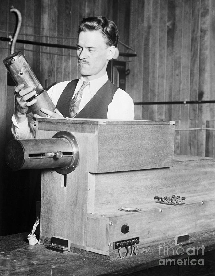 Philo T. Farnsworth With Early Photograph by Bettmann