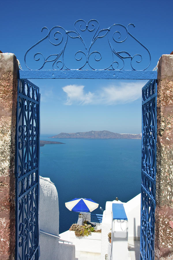 Photo Of The Ocean Through A Blue Gate Photograph by Arturbo