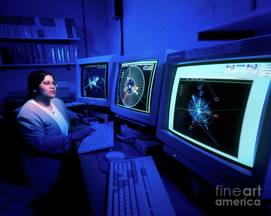 Physicist Studying Particle Collisions Photograph by Fermilab/science Photo Library