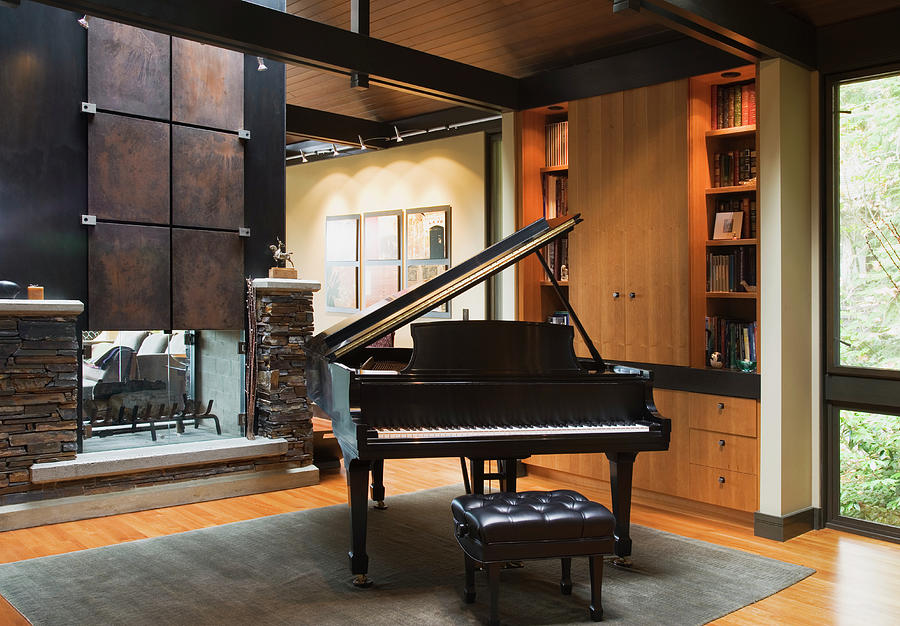 Piano Beside Fireplace In Living Room Photograph by Andersen Ross