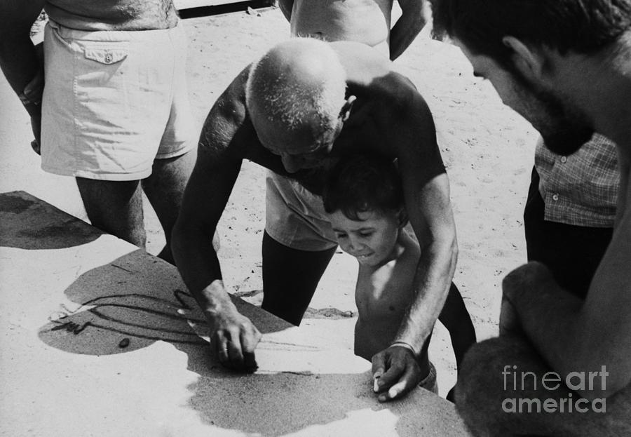 Picasso Sketching Pigeon With Son Claude Photograph by Bettmann