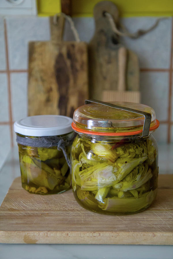 Pickled Artichokes In A Mason Jar Photograph by Patricia Miceli