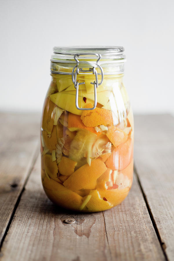 Pickled Citrus Fruits In Vinegar Photograph by Canan Czemmel