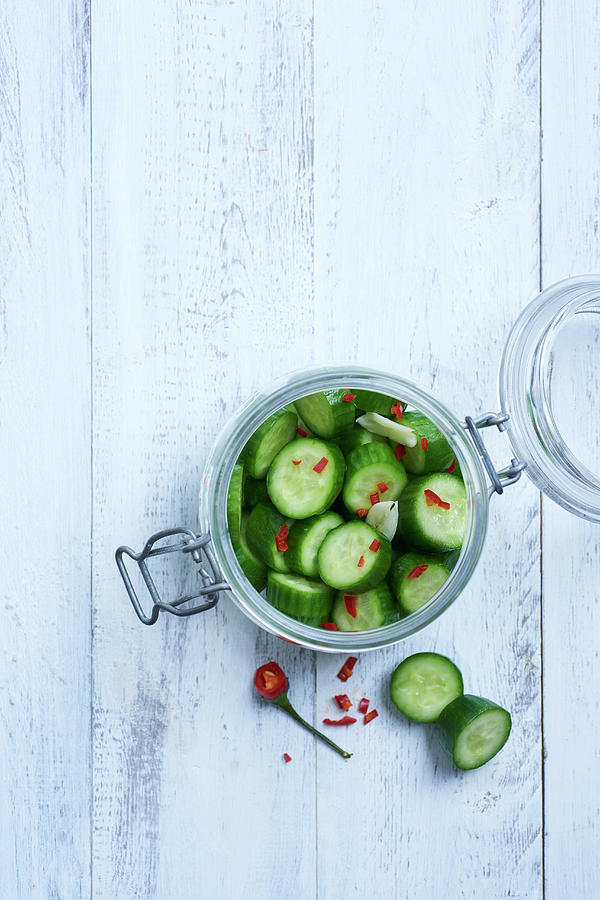 Pickled Cucumber Slices Photograph by Amanda Stockley