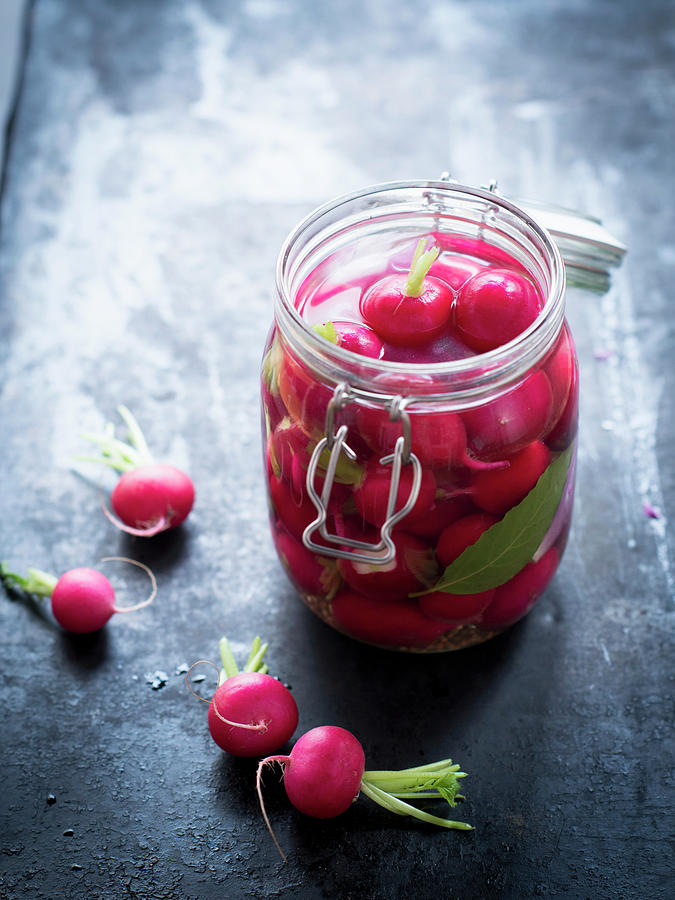 Pickled, Fermented Radishes In A Preserving Jar Photograph by Manuela Rther