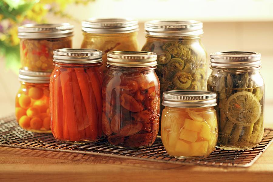 Pickled Fruit And Vegetables In Screw-top Jars Photograph by Perry Jackson