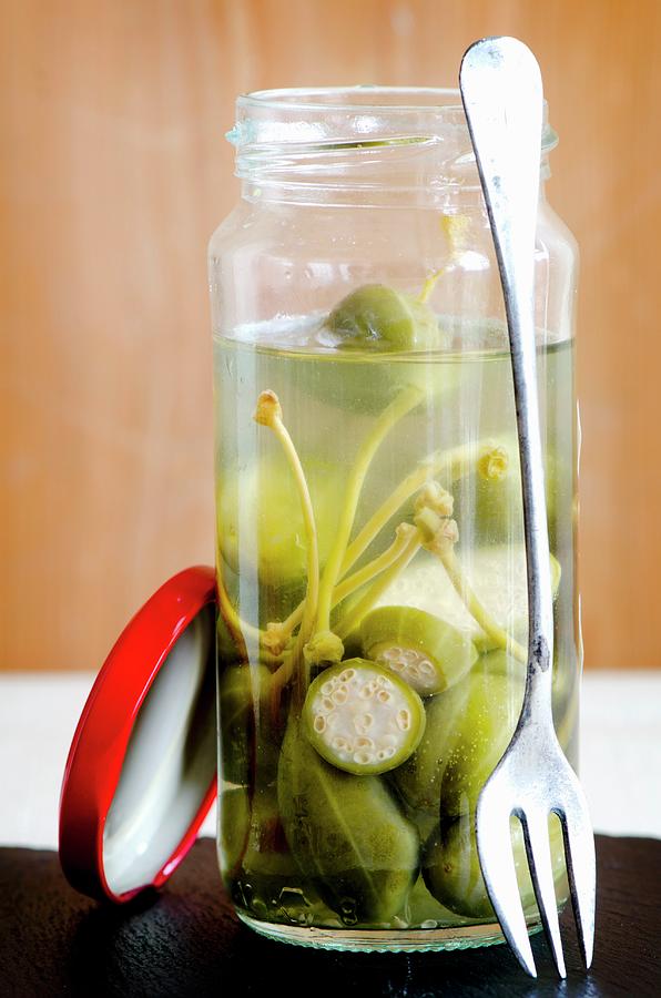 Pickled Giant Capers In A Jar Photograph by Jamie Watson