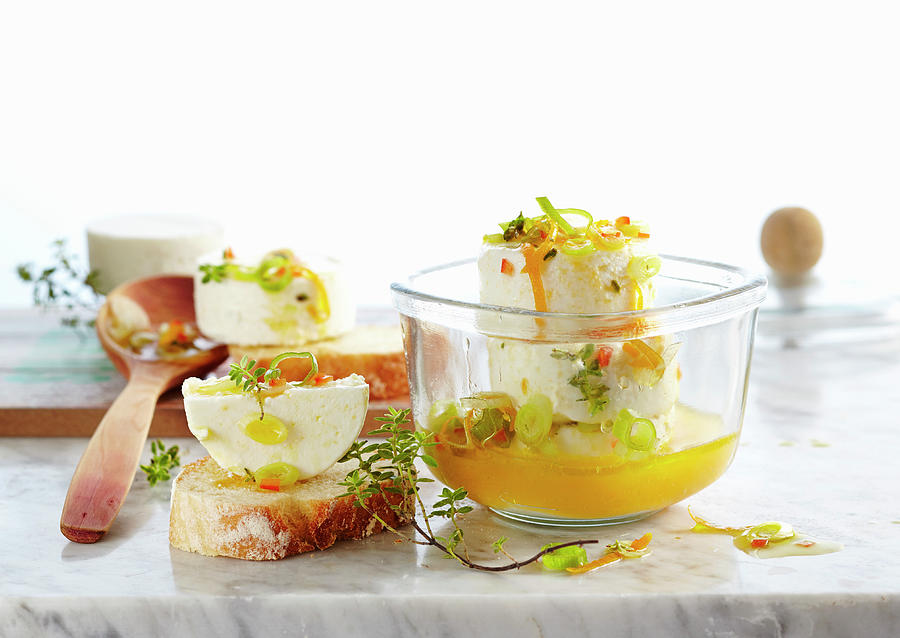 Pickled Goats Cheese In An Orange Marinade With Spring Onions And Jalapenos Photograph by Teubner Foodfoto