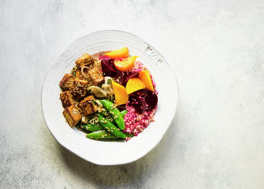 Pickled Golden And Red Beets Tossed With Quinoa, Topped With Grilled Tofu And Sugar Snap Peas Photograph by Lisa Rees