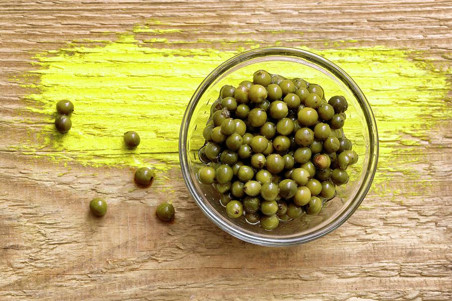 Pickled Green Peppercorns In A Glass Bowl Photograph by Petr Gross