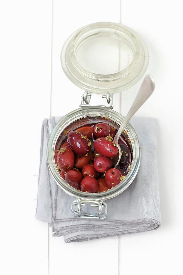 Pickled Kalamata Olives With Oregano In A Glass Jar Photograph by Rua Castilho