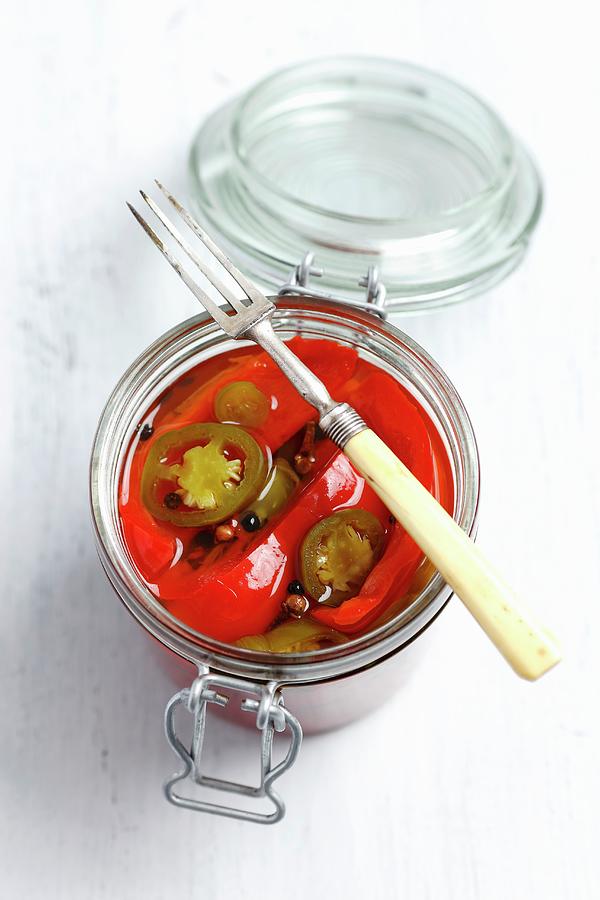 Pickled Peppers And Jalapeos Photograph by Rua Castilho