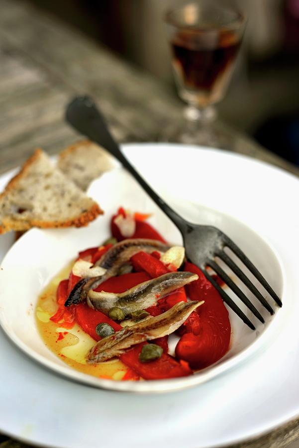 Pickled Peppers With Anchovies And Capers Photograph by Roger Stowell
