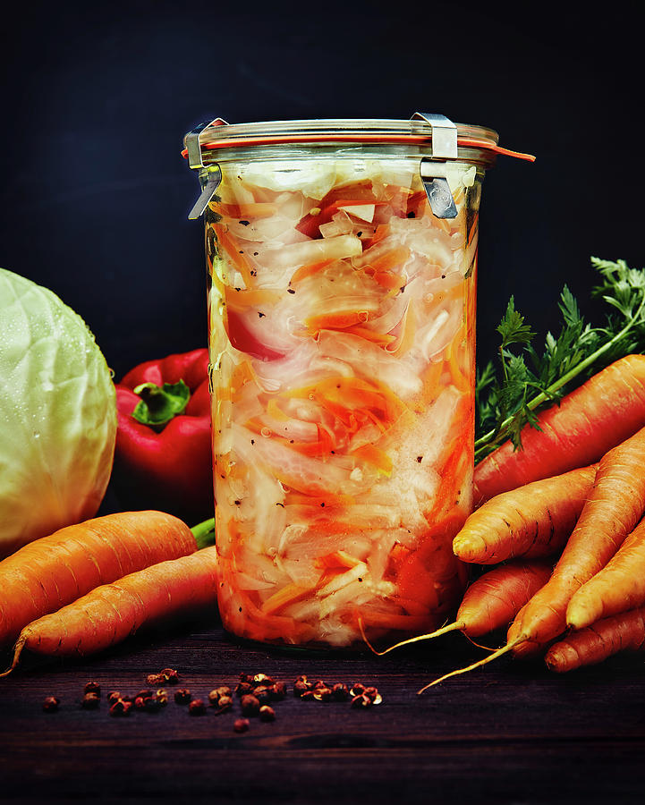 Pickled White Cabbage, Carrots And Peppers Photograph by Dominik Paunetto