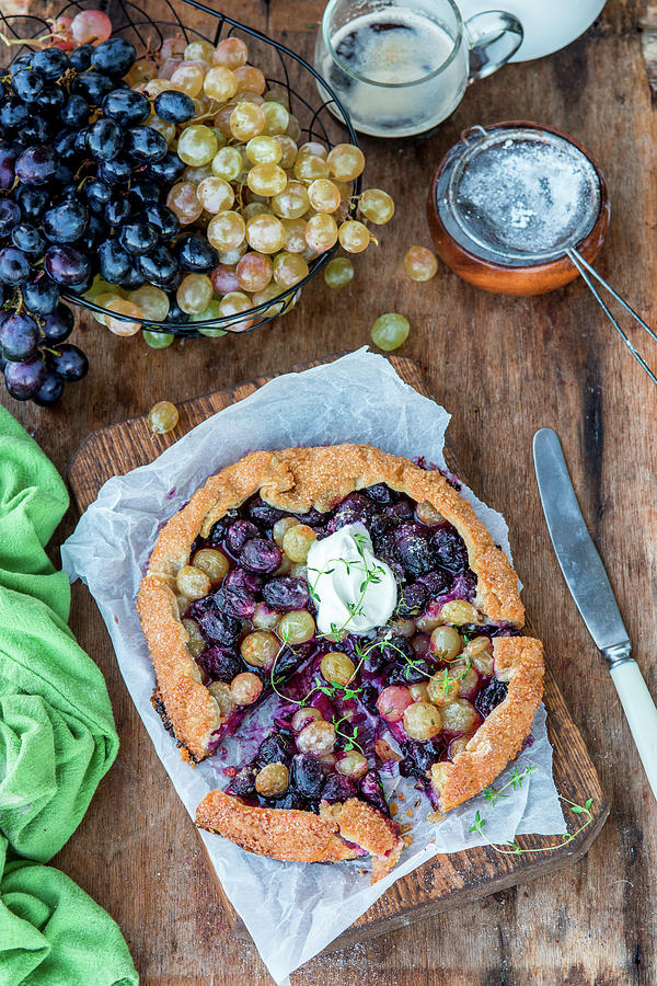 Pie With Grapes And Thyme Photograph by Irina Meliukh