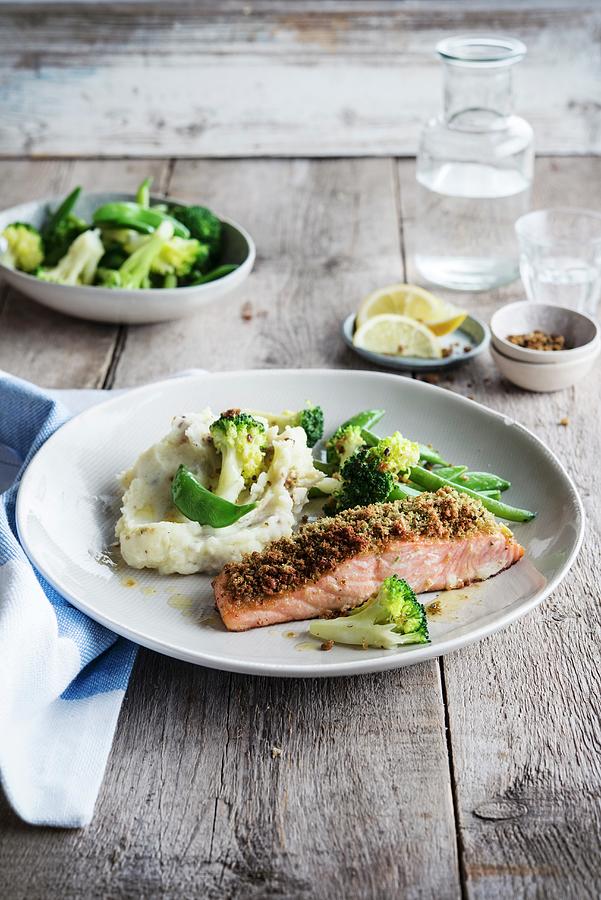 Piece Of Salmon Coated In Breadcrumbs And Herbs, Celeriac Mash, Broccolis And Green Beans Photograph by Thys