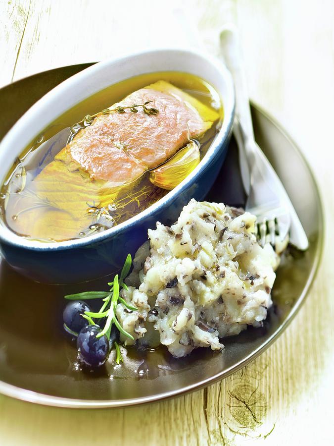 Piece Of Salmon Marinating In Olive Oil, Mashed Potatoes With Black Olives Photograph by Studio