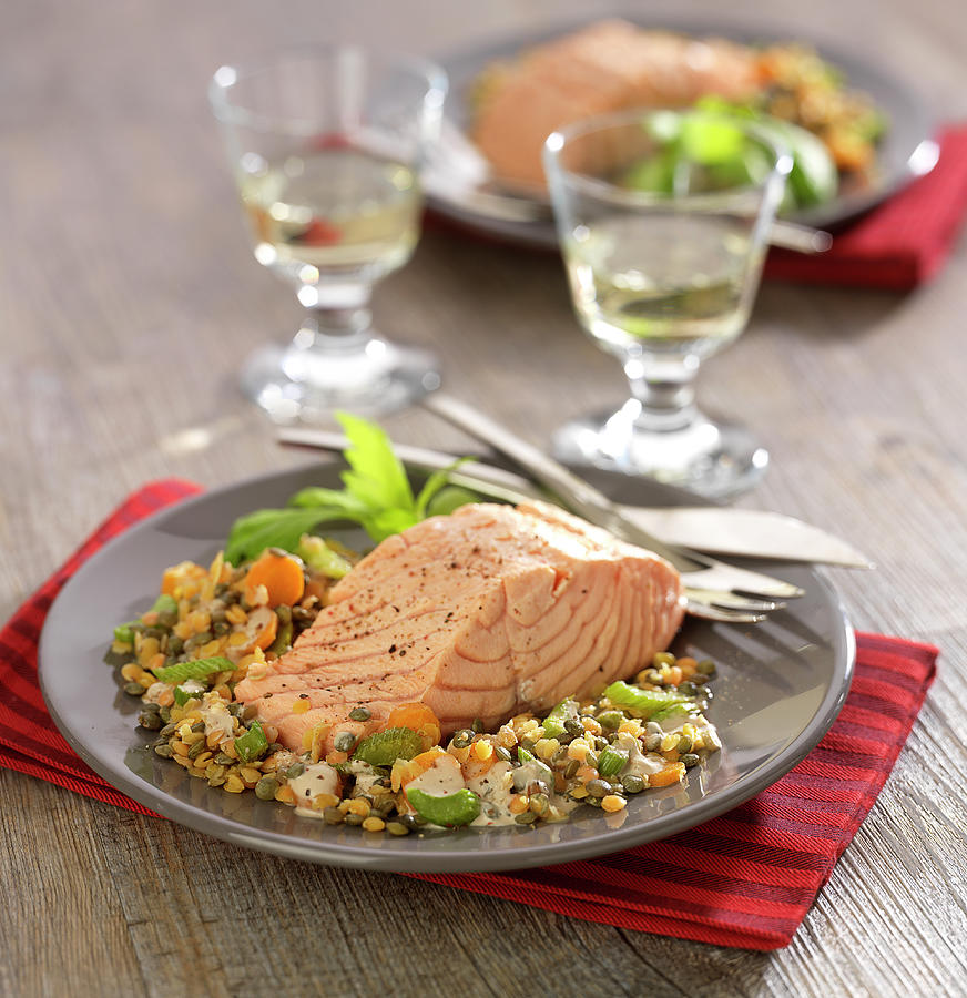 Piece Of Salmon With Two Types Of Lentils Photograph by Bertram