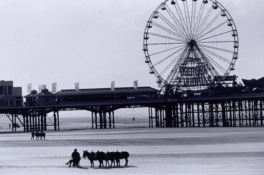 Pier And Donkey Rides, Blackpool Photograph by Walter Bibikow