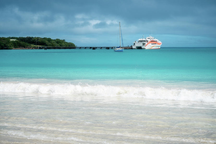 Pier and ferry boat at Kuto Bay in New Caledonia by Daniela Constantinescu Pier and ferry boat at Kuto Bay in New Caledonia by Daniela Constantinescu
