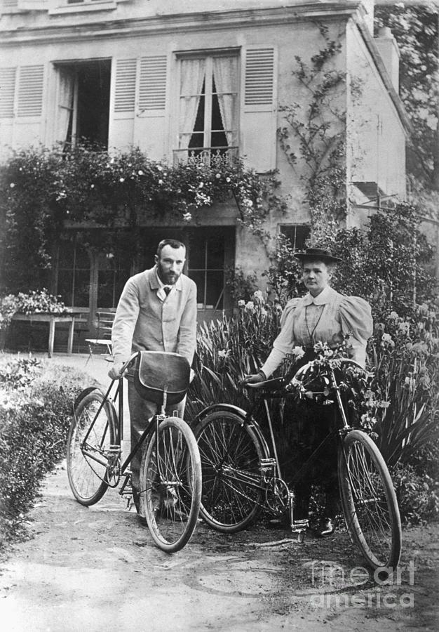 Pierre And Marie Curie With Bicycles Photograph by Bettmann