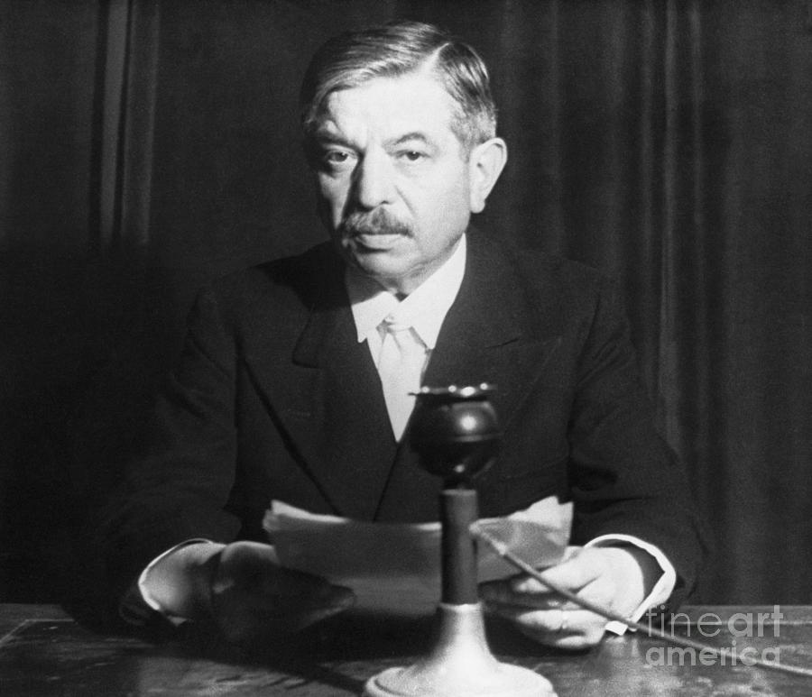 Pierre Laval Seated At Desk Photograph by Bettmann