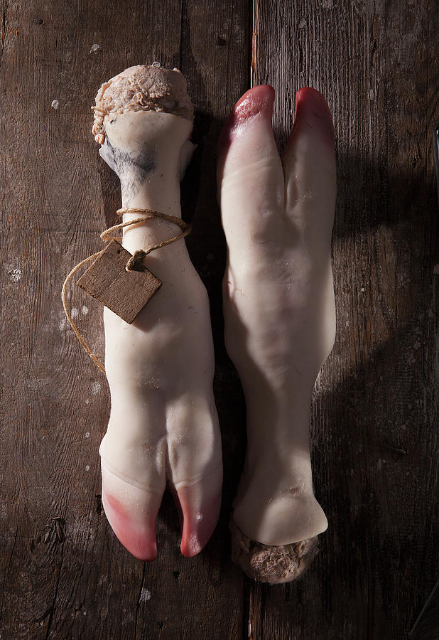 Pig Trotters On Wood Photograph by Blueberrystudio