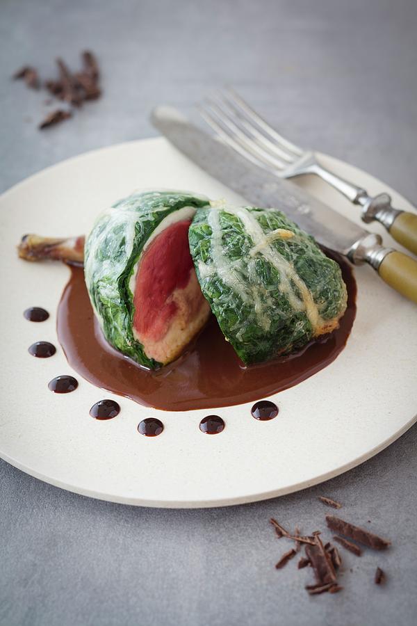 Pigeon Roulade With A Spinach Coating Photograph by Jan Wischnewski