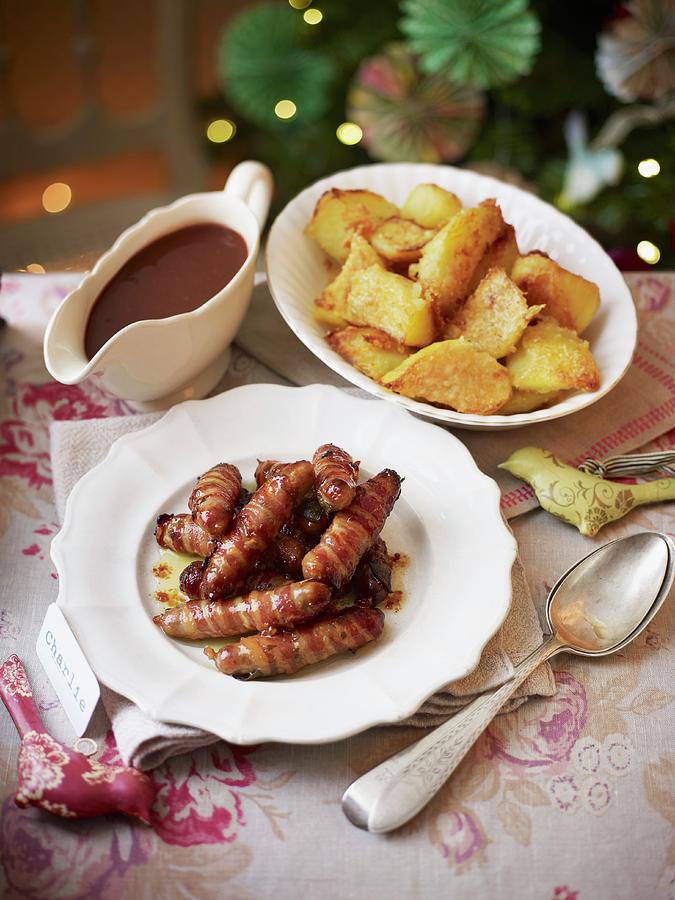 Pigs In Blankets With Fried Potatoes And Gravy Photograph by Myles New