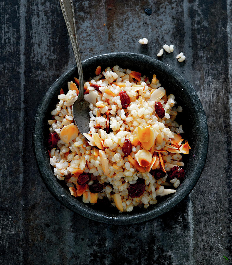 Pilau With Raisins And Roasted Almonds Photograph by Udo Einenkel