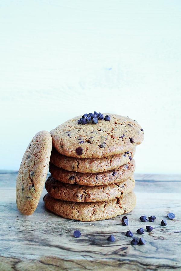 Pile Of Praline And Chocolate Chip Cookies Photograph by Jubault