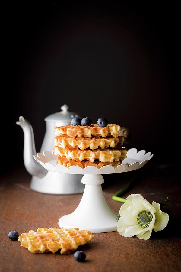 Pile Of Waffles Ligeoises And Blueberries On A Presentation Dish Photograph by Hallet