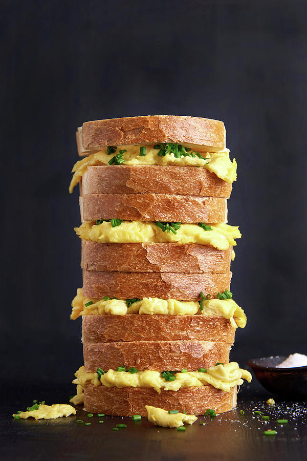Piled Up Sandwiches Made Of White Bread With Scrambled Eggs And Chives Photograph by Sylvia Meyborg
