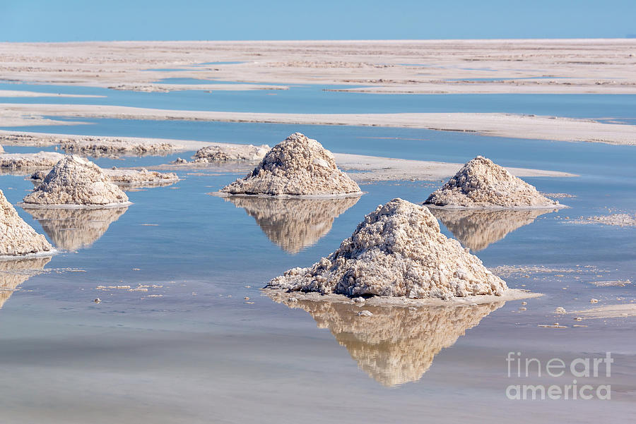Piles of salt in Salar de Uyuni Photograph by Delphimages Photo Creations