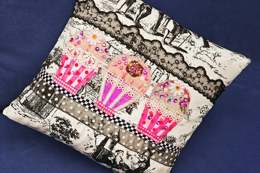 Pillow Decorated With Fabric Cupcakes Photograph by Linda Burgess