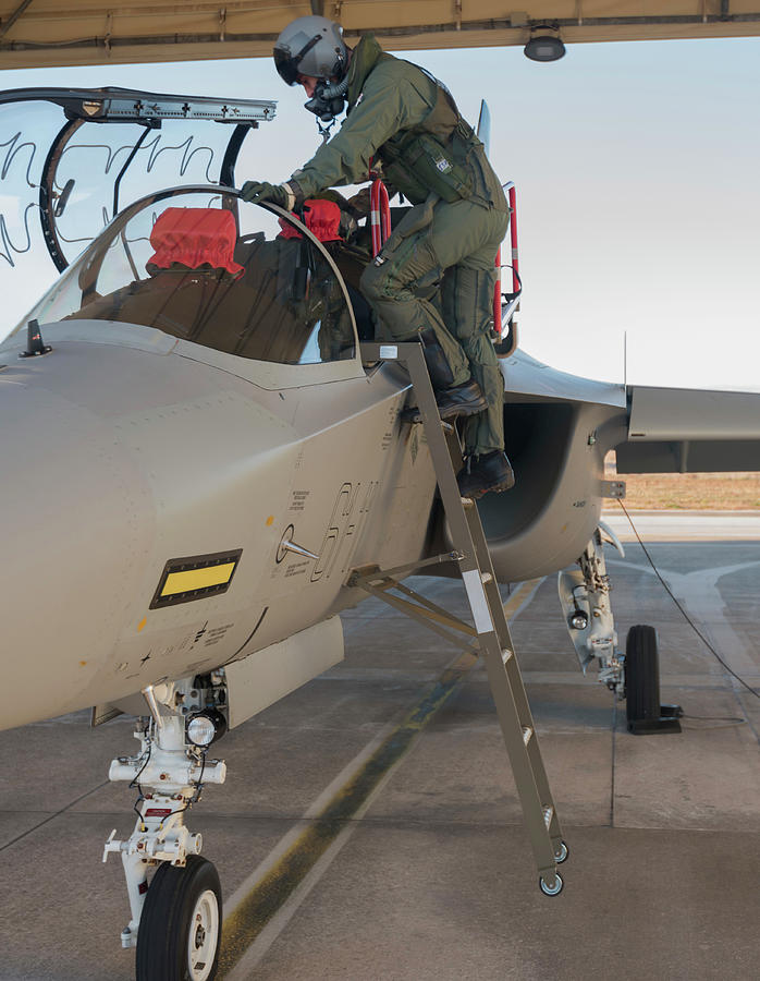 Pilot Climbing Inside His T-346 Photograph by Simone Marcato