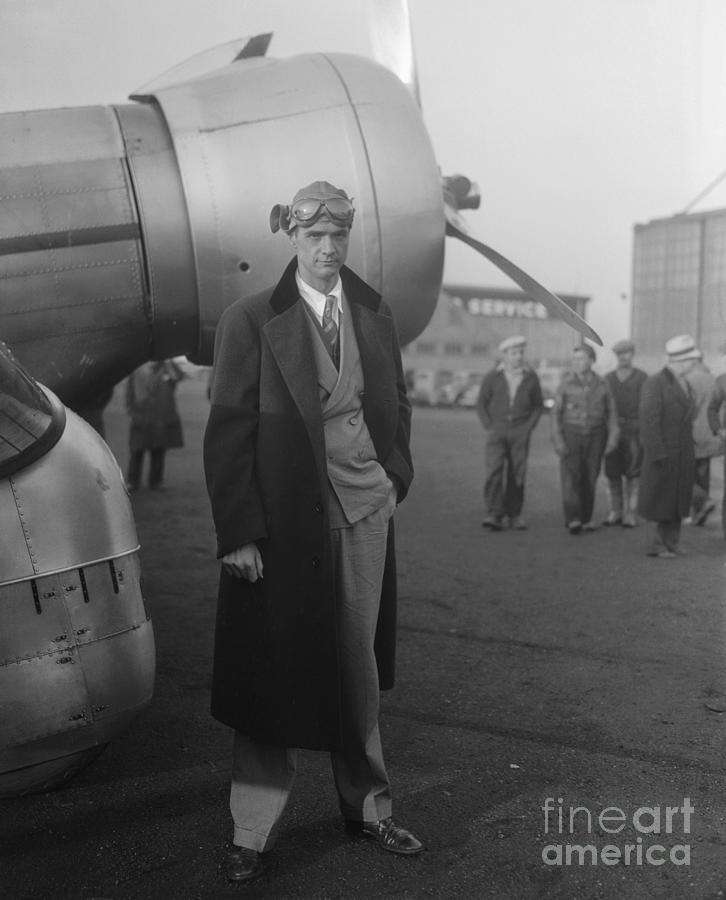 Pilot Howard Hughes Standing In Front Photograph by Bettmann