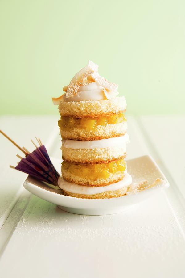 Pina Colada Sponge Cake Tower Photograph by Michael Wissing