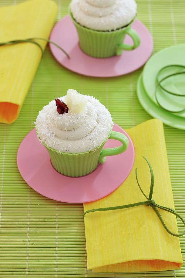 Pineapple And Coconut Cupcake With Cranberry Photograph by Kirchherr, Jo
