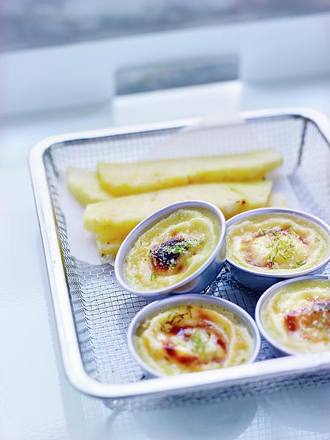 Pineapple And Lime Zest Baked Egg Custards Photograph by Amiel