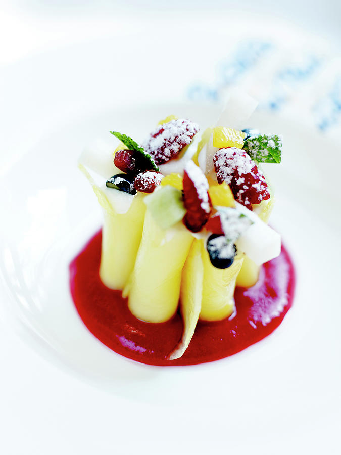 Pineapple Cannelonis With Summer Fruit And Coulis Photograph by Amiel
