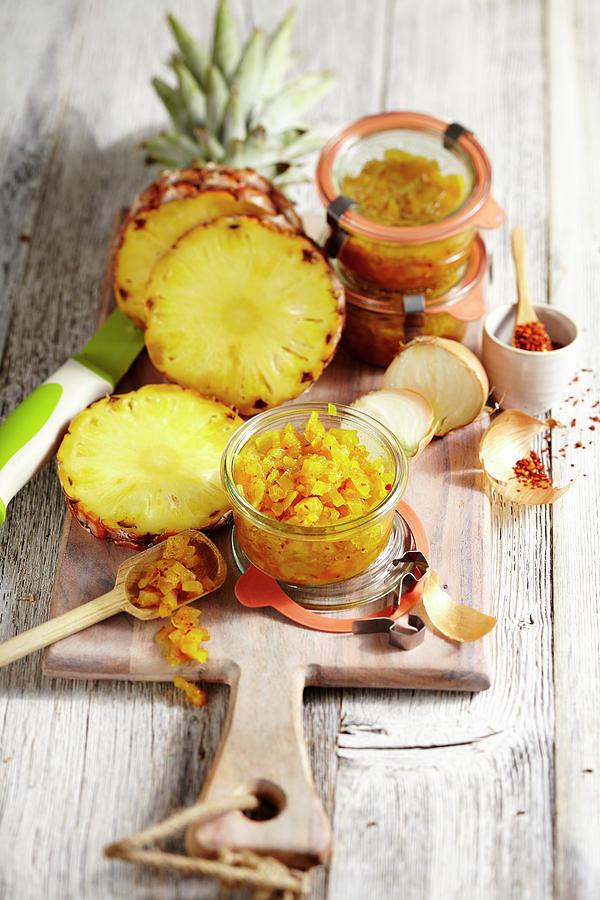 Pineapple Chutney With Curry In Glass Jars Photograph by Teubner Foodfoto