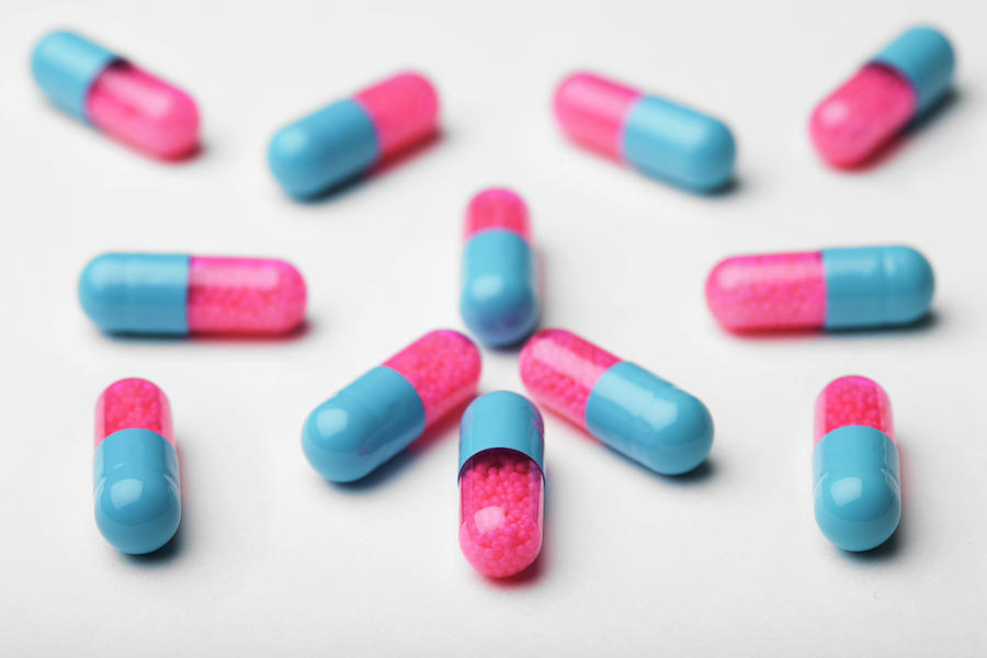 Pink And Blue Pills Photograph by Roc Canals Photography