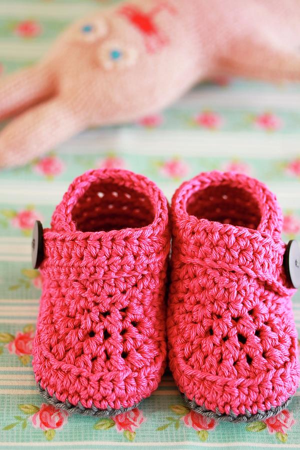 Pink, Crocheted Baby Bootees Photograph by Carmen Mariani