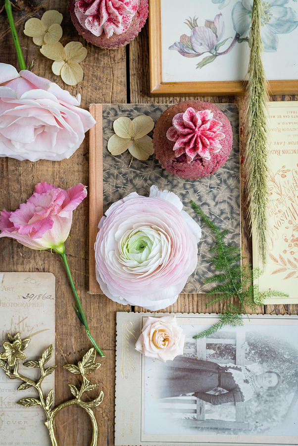 Pink Flowers, Vintage Cards, Antique Photos And Strawberry Cupcakes On Wooden Table Photograph by Lucy Parissi