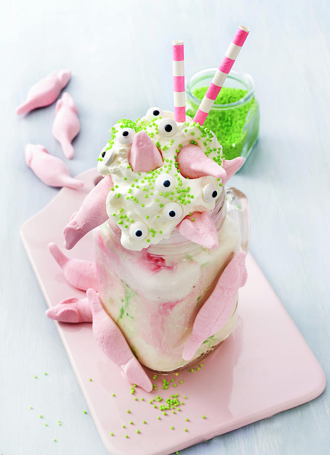 Pink Freak Shake Topped With Cream, Sugar Pearls And Marshmallow Mice Photograph by Stefan Schulte-ladbeck